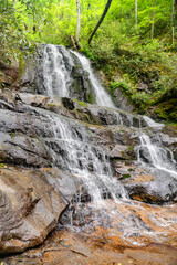 Fototapeta premium waterfall among rocks in a forest in Virginia.