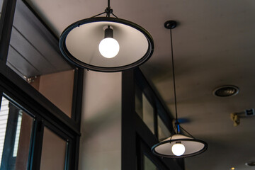 lamps hanging from the ceiling in the cafeteria