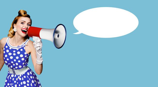 Ad image - happy pin up cute woman shout mega phone megaphone advertisement. Pinup girl in dress, gloves advertise, use loudspeaker bullhorn. Isolated plain blue background with empty speech bubble.