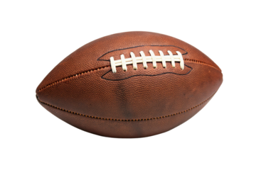 Classic brown football ready for the game on a field under clear skies with excitement for the championship match ahead, cut out