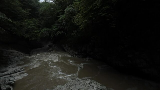 water flowing into a cave