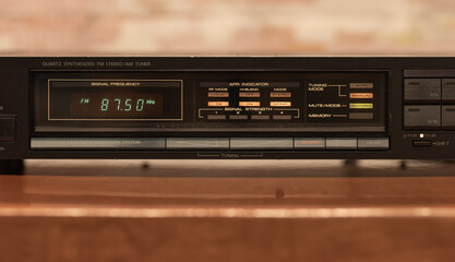 Obraz premium Close-Up View of a Vintage Radio Preset Station Panel