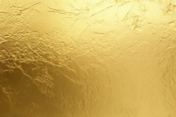 Gold foil textured background. Abstract grunge wallpaper with glossy surface.