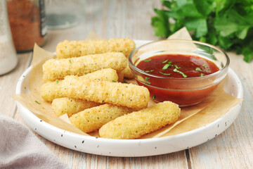 Mozarella sticks with barbeque sauce