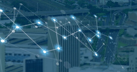 Image of network of connections and data processing over cityscape