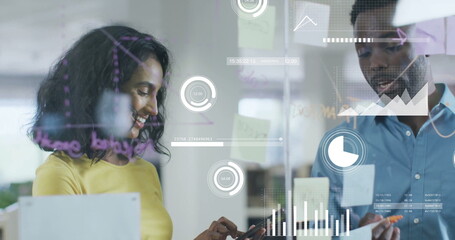 Image of financial data processing over diverse business people in office