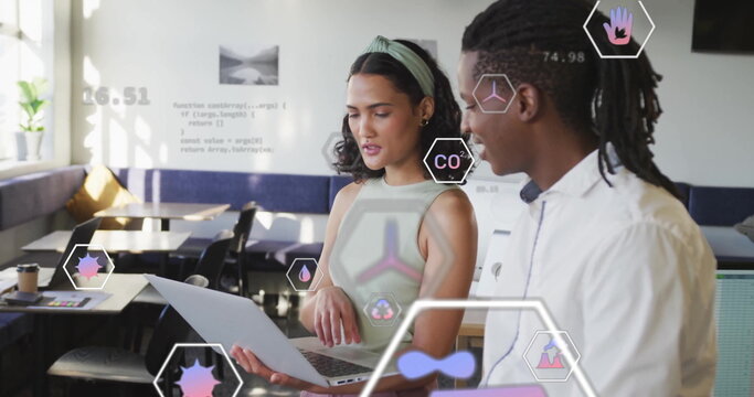 Image of eco icons and data processing over diverse business people in office - Powered by Adobe