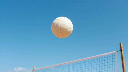 A volleyball mid-air, just above the net, with a clear blue sky in the background