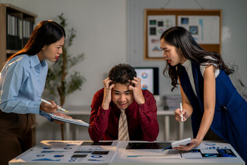 Fototapeta premium Three people are in a meeting room, with one man looking very upset
