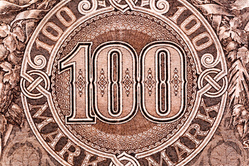 Vintage elements of old paper banknotes.Bonistics.Old Germany money 1918 (one hundred mark).Banknote Kaiser's Germany.Fragment banknote for design purpose.