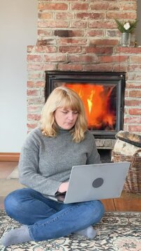 Cozy indoor work session by the fireplace