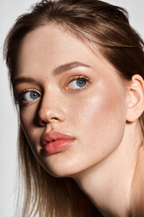 Young beauty with captivating features radiates chic elegance in fresh spring styling