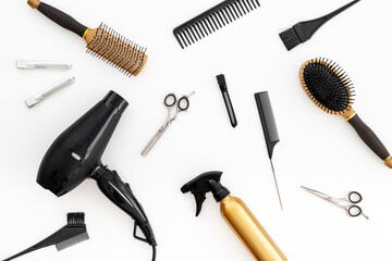 Pattern flat lay of hairdresser and barber tools and accessories on white background, top view