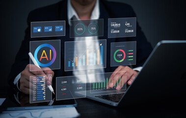 Businessman analyzing AI-powered data visualization with financial charts, analytics, and digital...