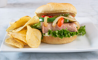 spam burger  top with  peppers and onions