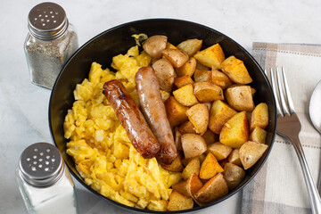  breakfast sausage  with scramble eggs and home fries