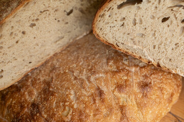 Close-up of freshly baked sourdough bread, perfect for bakery websites or food blogs.