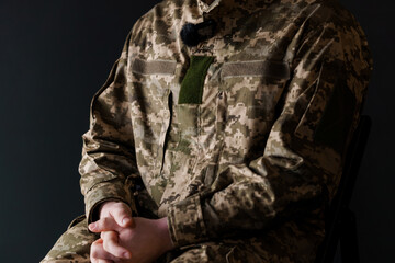 Soldier with Bionic Leg Prosthesis in Camouflage Uniform