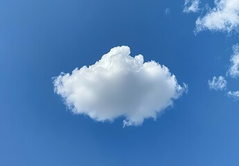 Fluffy White Cloud Floating in Clear Blue Sky with a Few Wispy Clouds on a Bright Sunny Day Capturing the Essence of Tranquility and Calmness