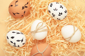 Composition with Easter eggs on beige background. Spring concept