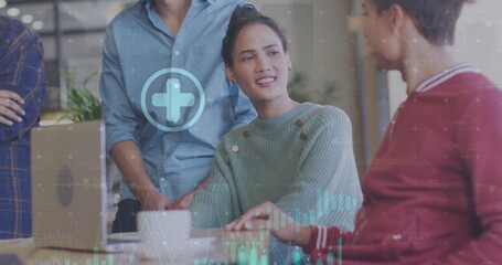 Image of financial data processing over diverse colleagues having meeting in office