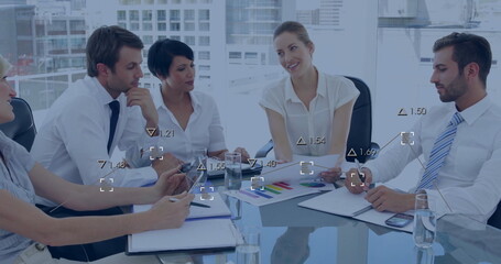 Image of financial data processing over diverse business people in office