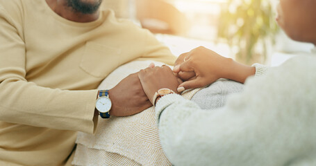 Home, closeup and couple holding hands, love and comfort with marriage, support and relationship....