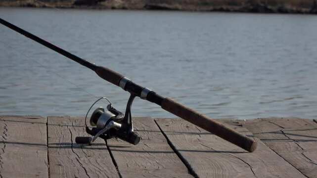 fishing rod on the background of the river