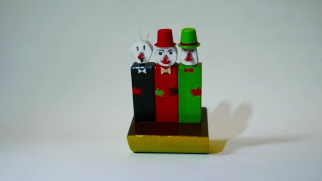 swinging wooden clowns, roly poly toy