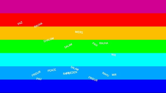 peace flag with the typical bright colors with many writings of many world languages ​​that appear randomly