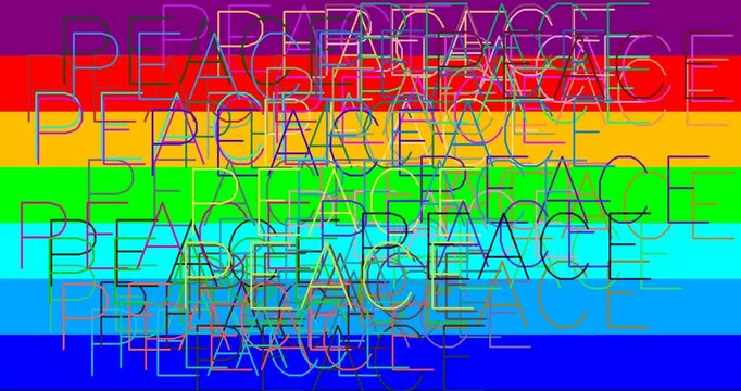 peace flag with the typical bright colors with many writings of many world languages ​​that apear randomly