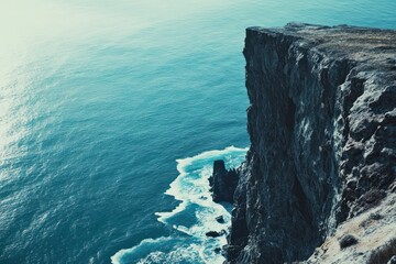 Dramatic ocean view alongside a large cliff side setting