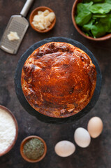 Torta Pasqualina - traditional homemade Italian, Argentinian Easter savory spinach and ricotta tart with eggs