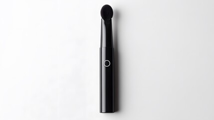 Fototapeta premium Sleek Black Makeup Brush with Round Tip for Precise Application