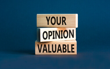 Your opinion valuable symbol. Concept words Your opinion valuable on beautiful wooden blocks. Beautiful grey table grey background. Business your opinion valuable concept. Copy space.