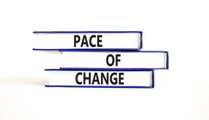 Pace of change symbol. Concept words Pace of change on beautiful blue white books. Beautiful white background. Business pace of change concept. Copy space.