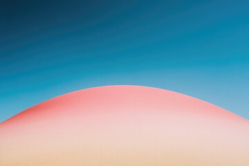 Soft gradient blending warm pink and cool blue hues creates sere