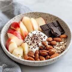 Healthy snack bowl apples yogurt chocolate nuts home kitchen food photography fresh ingredients