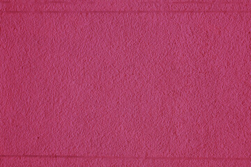 Abstract background made of pink plaster.