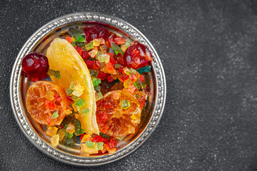 Candied peel and fruit orange, kumquat, tangerine, cherry, mango and others Sugar-coated fruit...