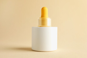 Bottle of skin care product on beige background