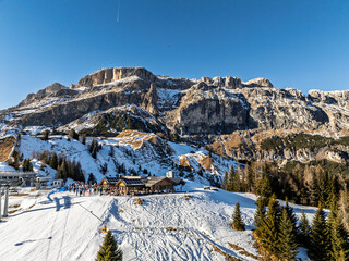 Italian Dolomites drone aerial view in winter snow ski sunny days. Sella Ronda Marmolada .Aerial...