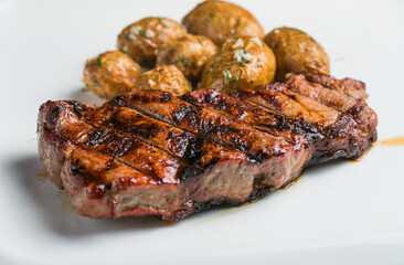 grilled t-bone steak with grilled veggies