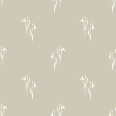 Seamless pattern of snowdrop flowers against a soft background