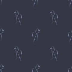 Seamless pattern of snowdrops blooming in early spring against a dark background