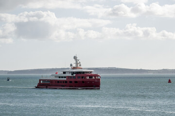 Akula Expedition yacht in The Solent with The Isle of Wight in the background Hampshire England