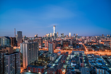 Fototapeta premium A panoramic view of the high-rise building complex in the city of Beijing, China at night