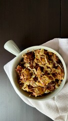 Delicious fried chicken or beef liver with salt, spices and herbs in a ceramic plate
