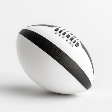 A single glossy 3D rendered miniature football, classic black and white pattern, textured surface, soft shadows, neatly arranged on a white isolated background