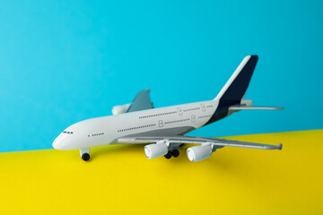 One plane model on color background, closeup